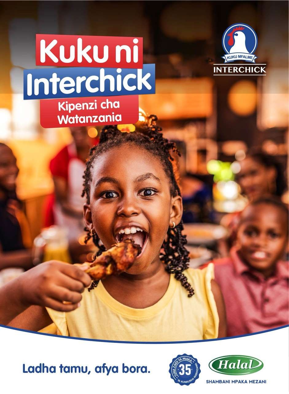 Happy child eating chicken